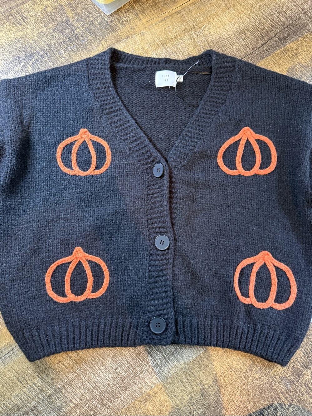 Lena RY Black V‑Neck Cardigan with Orange Pumpkin Motifs